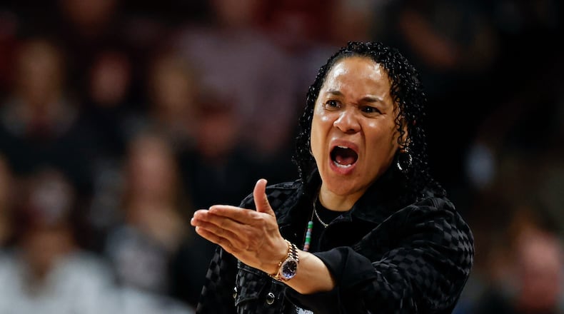 South Carolina head coach Dawn Staley argues a call during the second half of an NCAA college basketball game against Missouri in Columbia, S.C., Thursday, Feb. 26, 2026. (AP Photo/Nell Redmond)