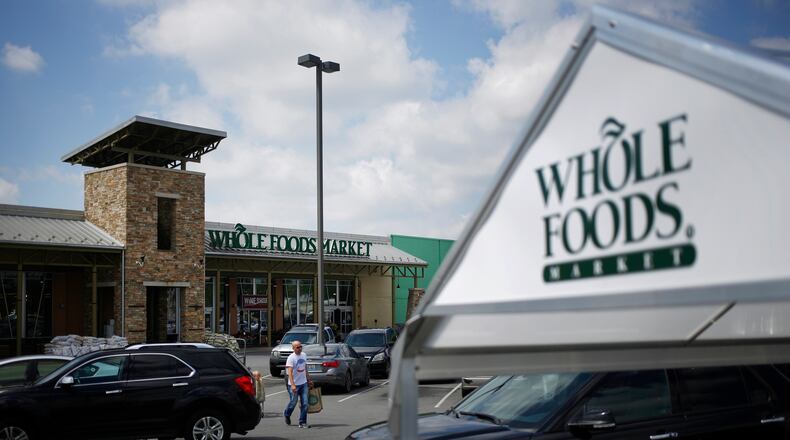 Whole Foods is testing grocery pickup in 30 minutes, with plans to expand the program this year. Bloomberg photo by Luke Sharrett