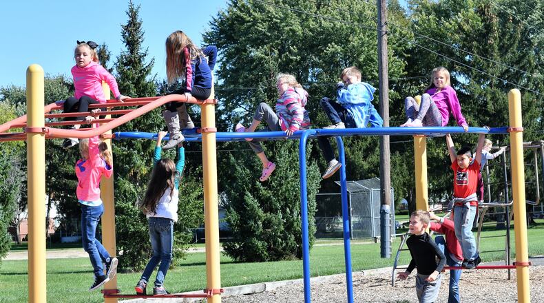 Students at Troy’s Cookson Elementary School spend time on the playground, with a ballfield at adjacent Campbell Park visible in the background. CONTRIBUTED
