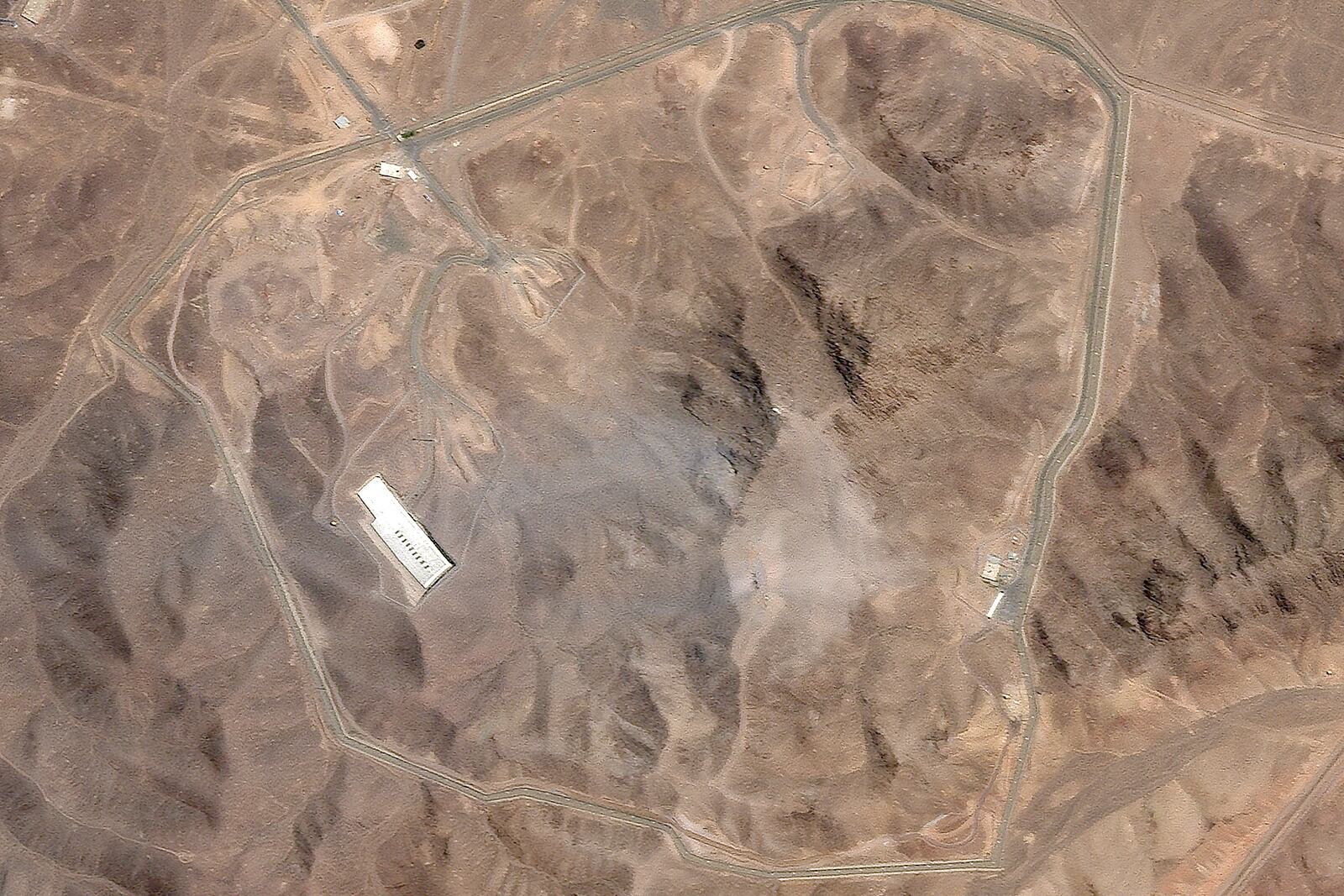 This satellite picture by Planet Labs PBC shows Iran's underground nuclear enrichment site at Fordo after a U.S. airstrike targeted the facility Sunday, June 22, 2025. (Planet Labs PBC via AP)