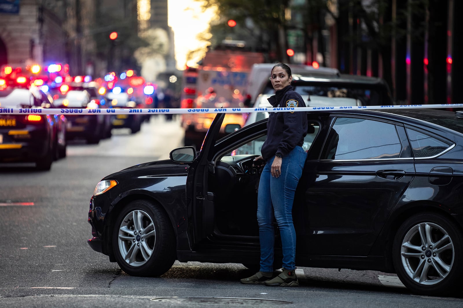 The scene on 52nd Street between Park and Lexington Avenue where a New York Police Department police officer was shot, Monday, July 28, 2025, in New York. (AP Photo/Angelina Katsanis)