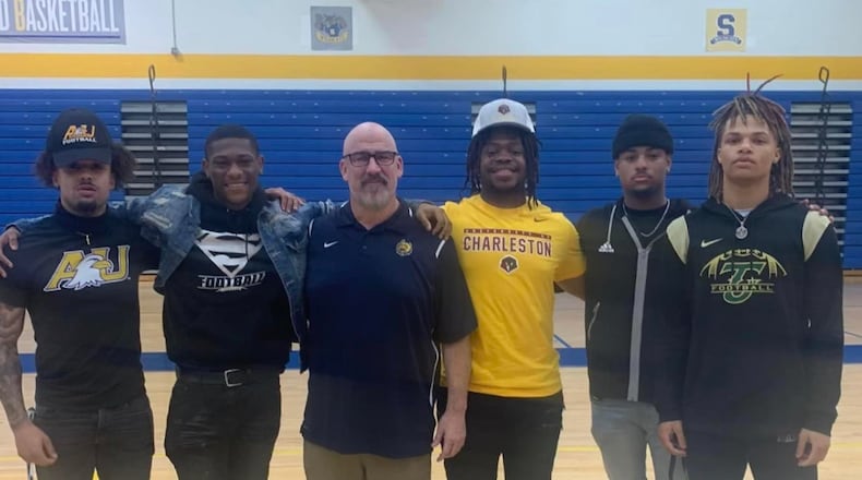 Danny Dellapina with Springfield High School athletes. Contributed photo