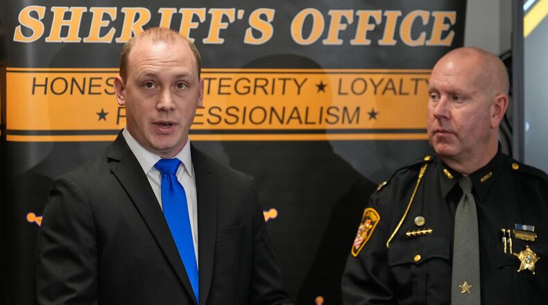 Medina County Sheriff's Detective Rodney Rees, left, and Captain Eric Bars, right, speak during a news conference concerning arrests in connection with the Nov. 16 burglary at the home of Cleveland Browns quarterback Shedeur Sanders, Thursday, Jan. 8, 2026, in Medina, Ohio. (AP Photo/Sue Ogrocki)