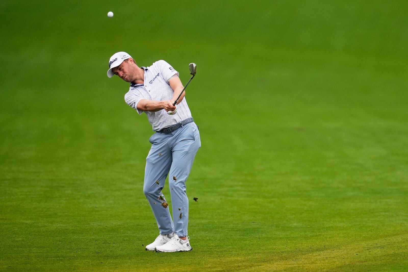 Justin Thomas hits from the fairway on the 10th hole during the second round of the PGA Championship golf tournament at the Quail Hollow Club, Friday, May 16, 2025, in Charlotte, N.C. (AP Photo/George Walker IV)