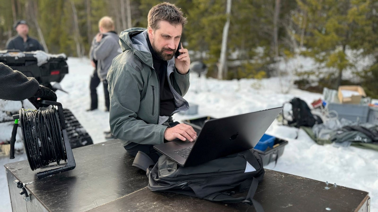This undated photo, issued by SVT, shows preparations in Junsele, Sweden for the livestream 'The Great Moose Migration' to document the annual Moose migration near Kullberg in northern Sweden. (SVT via AP)