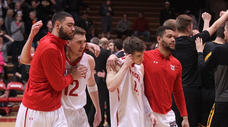Wittenberg players leave the court after a loss to Oshkosh in the second round of the NCAA tournament on Saturday, March 3, 2018, at Pam Evans Smith Arena in Springfield.