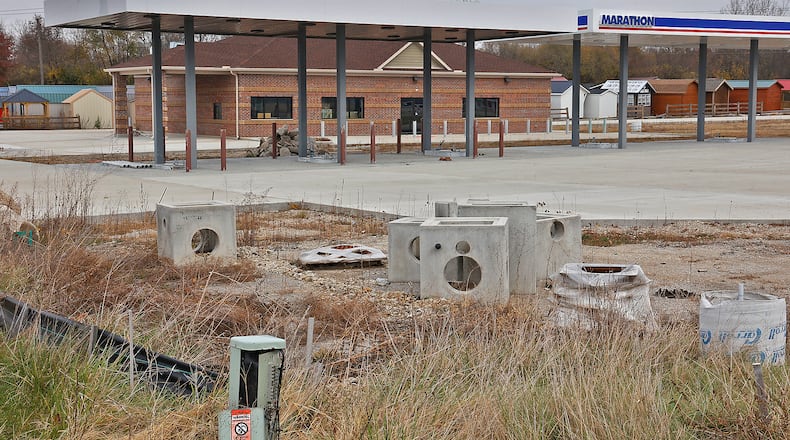 The Marathon gas station at the intersection of U.S. 40 and Ohio 235 in Clark County has been partially completed for over a year. BILL LACKEY/STAFF