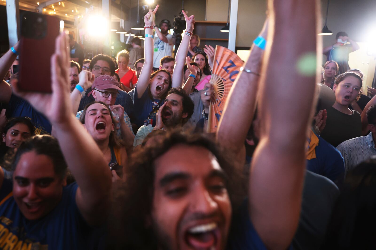 Supporters of Democratic mayoral candidate Zohran Mamdani cheer before he takes the stage at his primary election party, Wednesday, June 25, 2025, in New York. (AP Photo/Heather Khalifa)