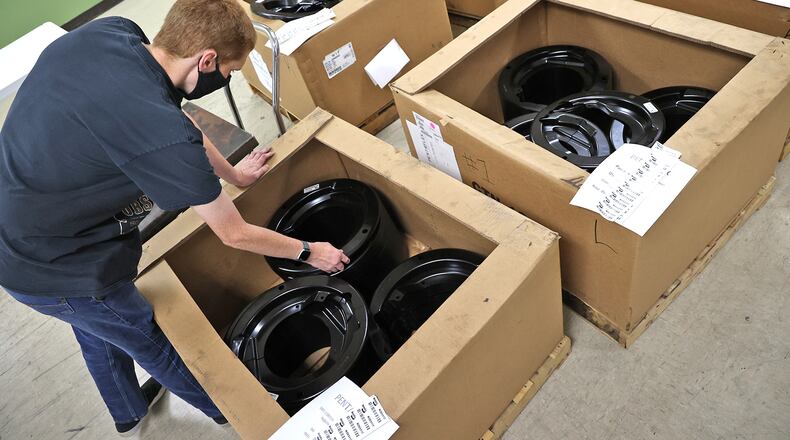The Abilities Connection (TAC) will observe National Disability Employment Awareness Month (NDEAM) by participating in a variety of activities to educate the community. Here, Thomas Holt, an employee at The Abilities Connection, places parts in a box after placing a label on them. BILL LACKEY/STAFF