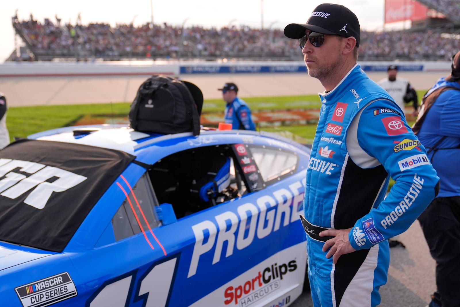 Denny Hamlin waits for the start of a NASCAR Cup Series auto race Sunday, June 1, 2025, in Lebanon, Tenn. (AP Photo/George Walker IV)