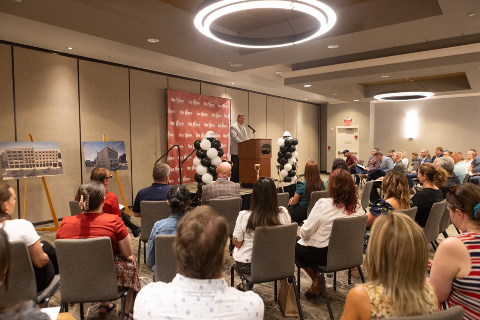 John Landess, executive director of the Turner Foundation, speaks at an event held before the groundbreaking for the Wren Building renovation project in downtown Springfield. PHOTO BY ROD HATFIELD.