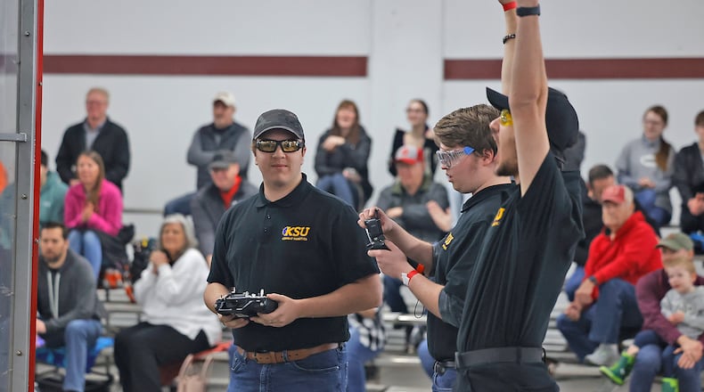 A team from Kent State University reacts after winning a Bot battle during the Xtreme Bots and Xtreme Drone Soccer competition Saturday, March 23, 2024 at the Clark County Fairgrounds. BILL LACKEY/STAFF