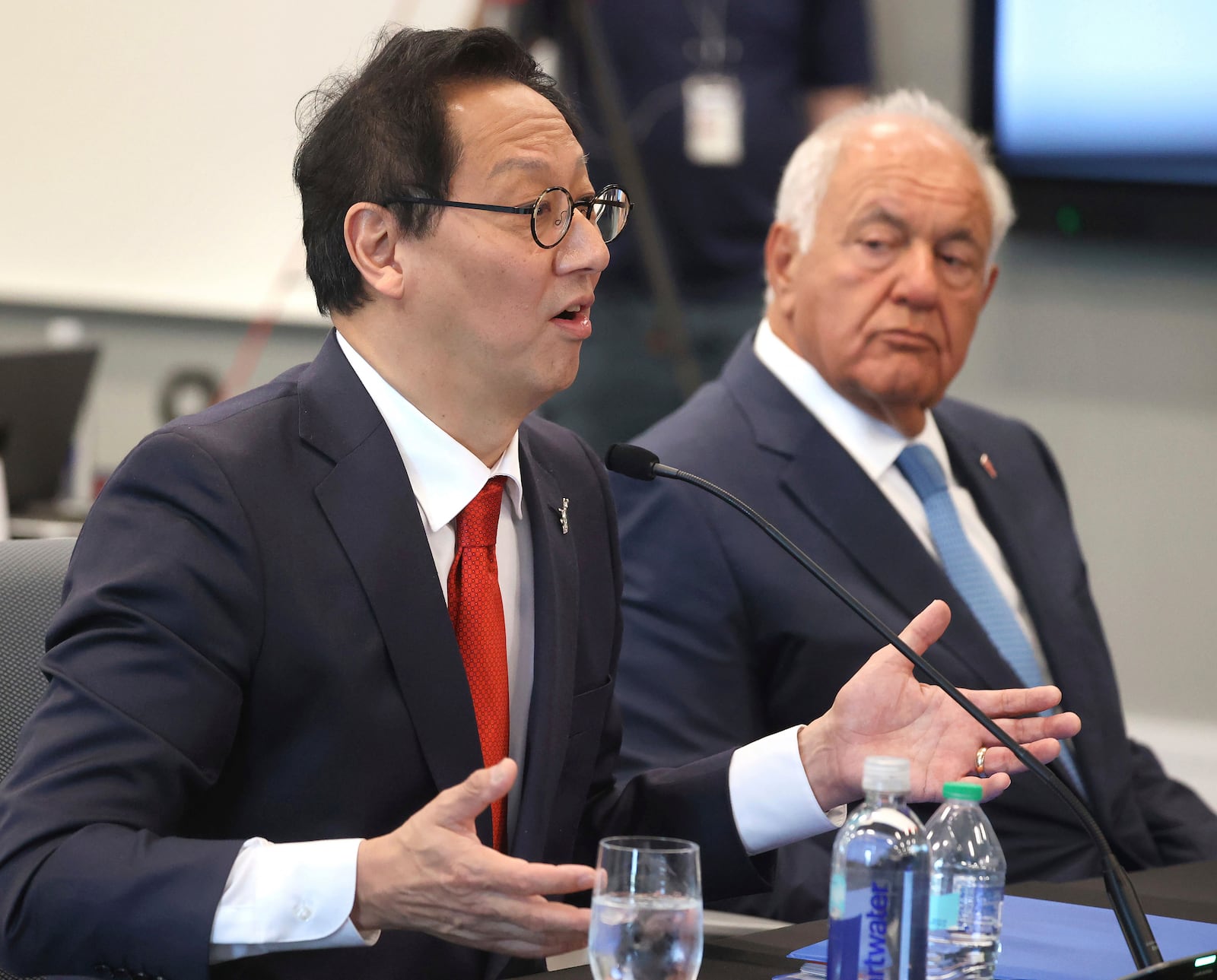University of Florida president-elect Santa Ono, left, answers a question, as Mori Hosseini, right, chairman of the UF Board of Trustees listens, during a meeting of the Florida Board of Governors to vote on Ono becoming Florida's 14th president at the University of Central Florida's downtown campus in Orlando, Fla., Tuesday, June 3, 2025. (Joe Burbank/Orlando Sentinel via AP)