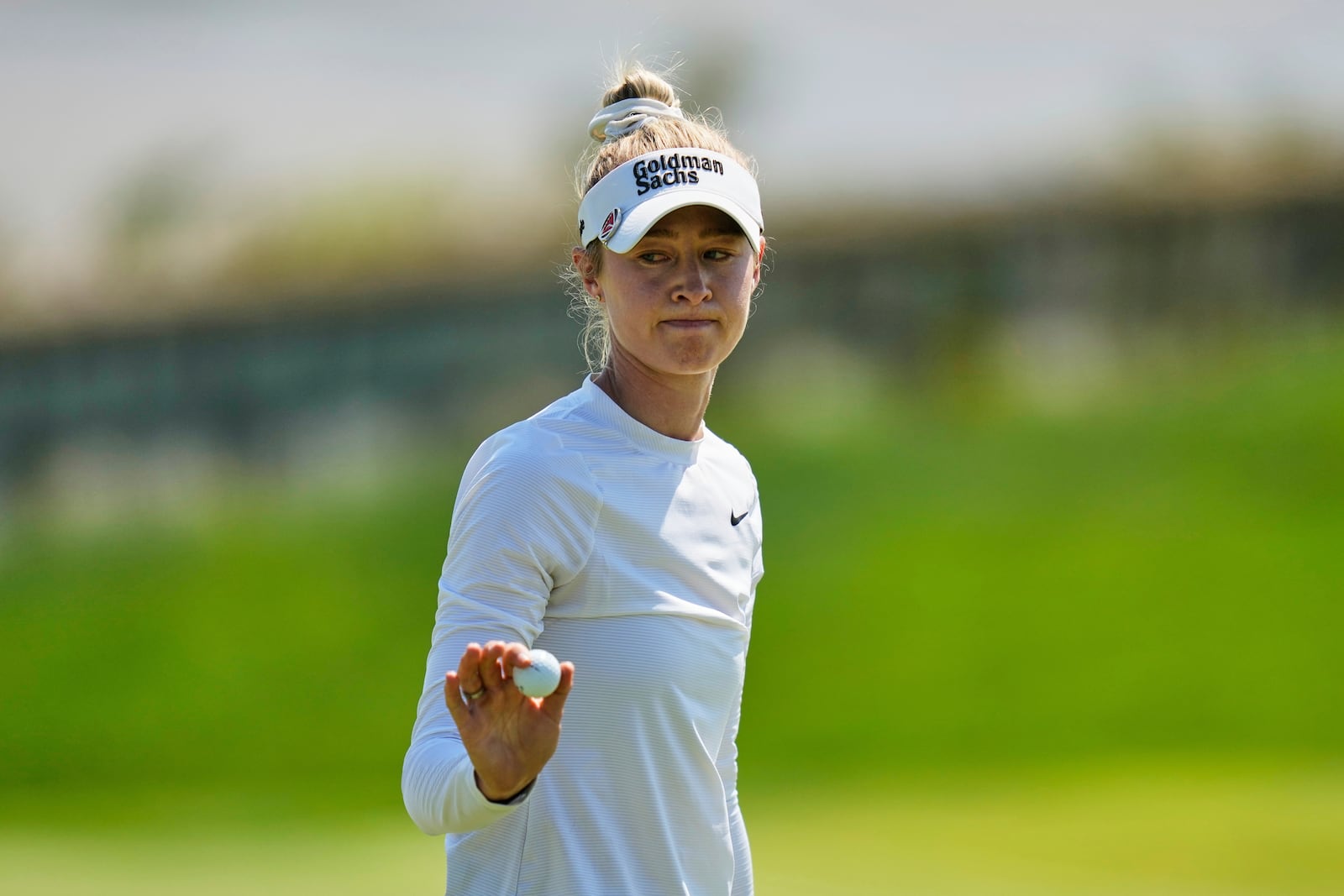 Nelly Korda reacts after finishing on the 18th green during the final round of the Mizuho Americas Open LPGA golf tournament, Sunday, May 11, 2025, in Jersey City, N.J. (AP Photo/Seth Wenig)