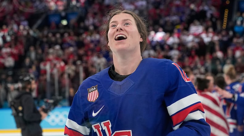 United States' Kelly Pannek (12) celebrates after a women's ice hockey gold medal game between the United States and Canada at the 2026 Winter Olympics, in Milan, Italy, Thursday, Feb. 19, 2026. (AP Photo/Hassan Ammar)