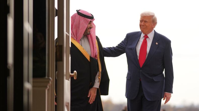 President Donald Trump welcomes Saudi Arabia's Crown Prince Mohammed bin Salman to the White House, Tuesday, Nov. 18, 2025, in Washington. (AP Photo/Evan Vucci)