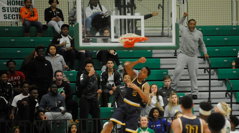Springfield’s RaHeim Moss jams. Springfield defeated host Northmont 71-49 in a boys high school basketball game on Friday, Dec. 22, 2017. MARC PENDLETON / STAFF