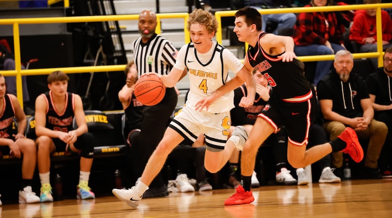 Shawnee High School junior guard Charlie Lemon drives past Tecumseh senior Brycen Dixon during their game on Tuesday night in Springfield. The Arrows won 45-41. CONTRIBUTED PHOTO
