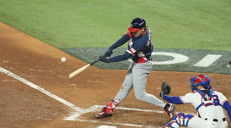 United States' Gunnar Henderson hits a home run during the fourth inning of a World Baseball Classic semifinal game against the Dominican Republic, Sunday, March 15, 2026, in Miami. (AP Photo/Rebecca Blackwell)
