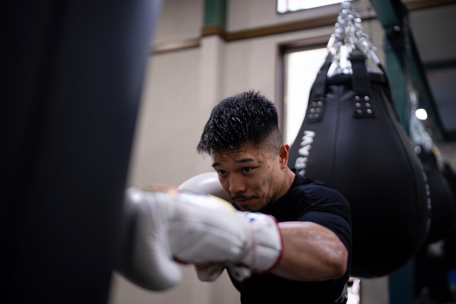 Junto Nakatani trains at a gym in Sagamihara City, Kanagawa Prefecture, Tuesday, July 1, 2025. (AP Photo/Louise Delmotte)