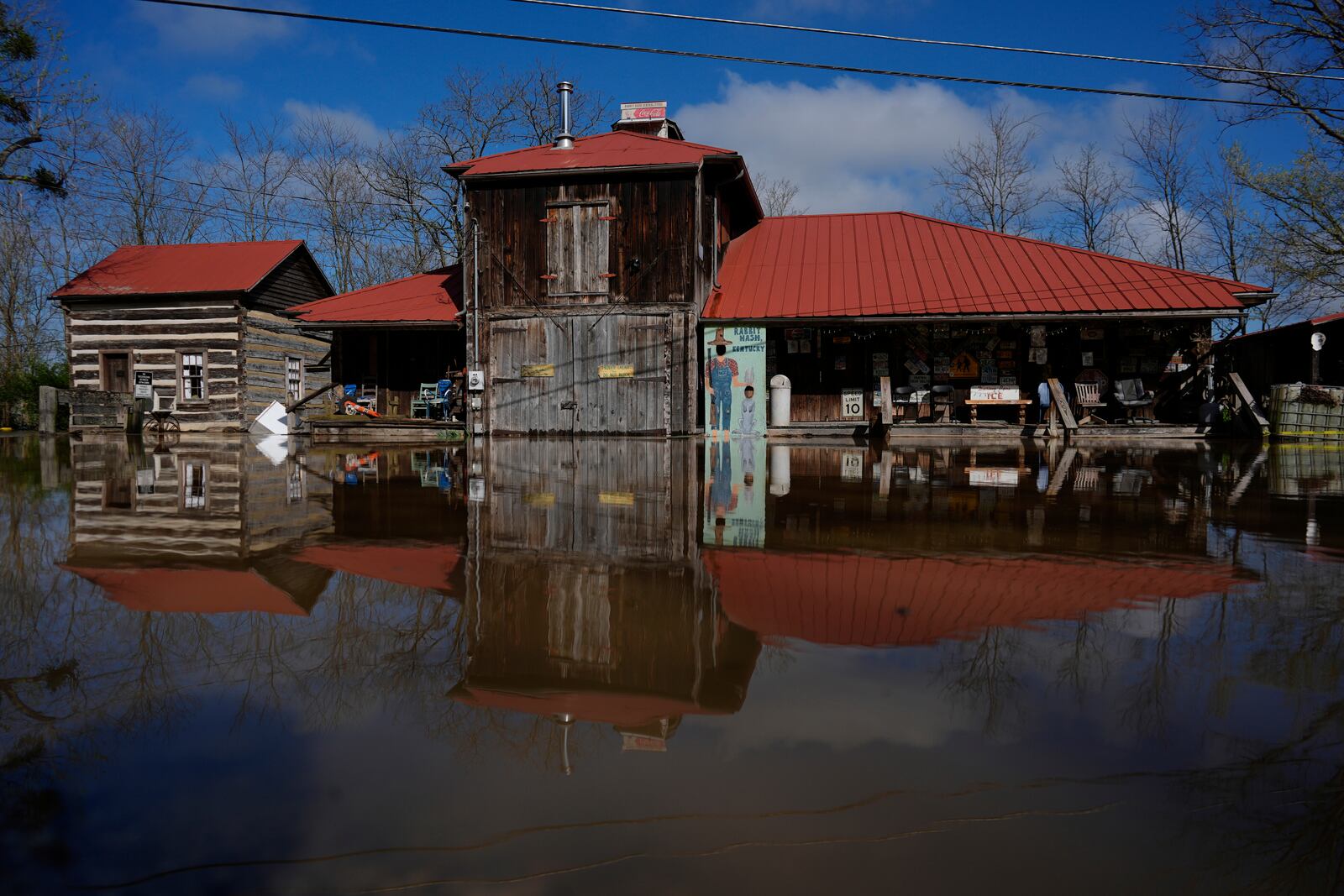 The rising Ohio River floods along Lower River Road, Monday, April 7, 2025, in Rabbit Hash, Ky. (AP Photo/Carolyn Kaster)