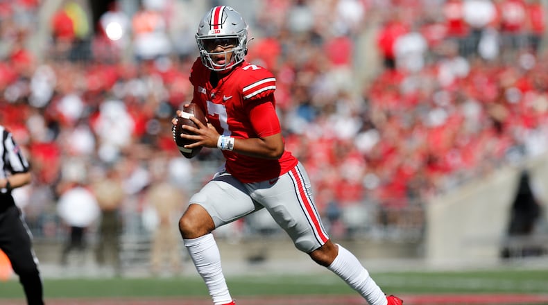 Ohio State quarterback C.J. Stroud looks for an open receiver during the first half of an NCAA college football game against Maryland, Saturday, Oct. 9, 2021, in Columbus, Ohio. Ohio State beat Maryland 66-17. (AP Photo/Jay LaPrete)