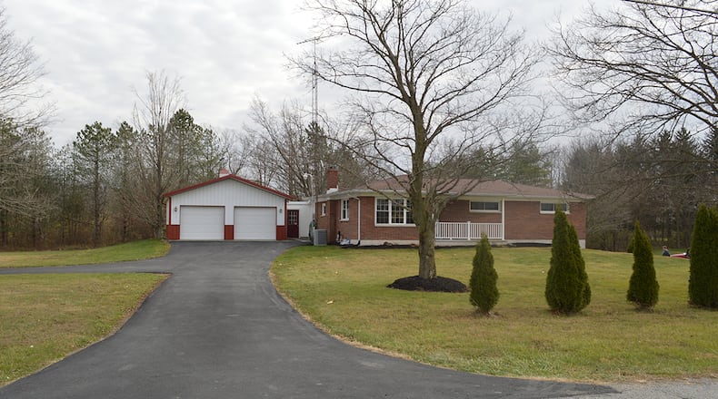 The 3-bedroom brick ranch with about 1,785 sq. ft. of living space boasts a full, walkout basement. The property includes an attached and a detached garage and ramps and an elevator for accessibility. CONTRIBUTED PHOTO