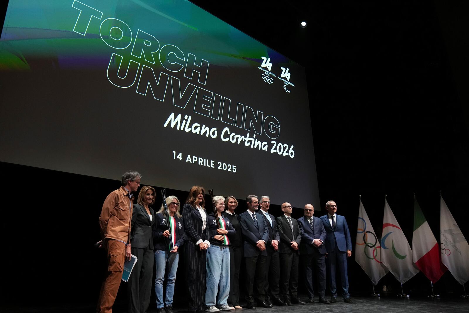 A view of the Milano Cortina 2026 Winter Olympics and Paralympics torches unveiling ceremony in Milan, Italy, Monday, April 14, 2025. (AP Photo/Antonio Calanni)