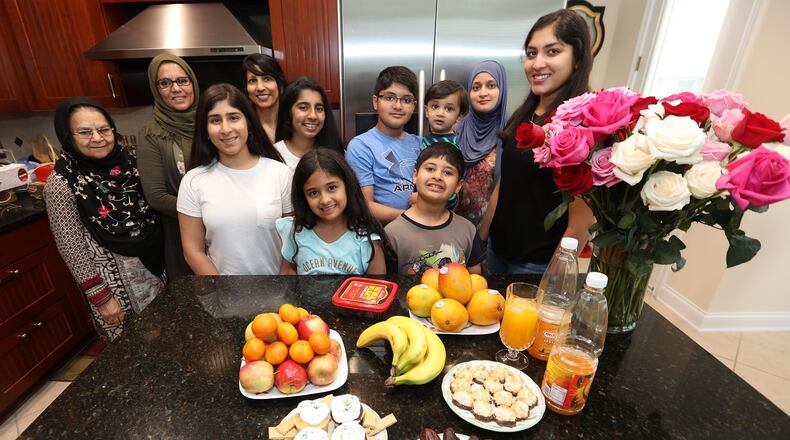 Samina Ahmed and members of the Muslim community are celebrating Ramadan by fasting from sunrise to sunset for the next 29 to 30 days. The dates, fruits and other items are eaten in the evening when they break their fast. Bill Lackey/Staff