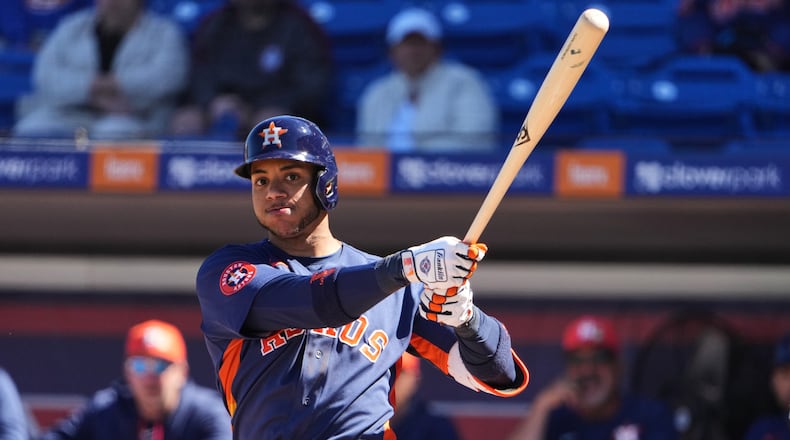 Houston Astros' Jeremy Peña fouls off a pitch during the second inning of a spring training baseball game against the New York Mets Tuesday, Feb. 24, 2026, in Port St. Lucie, Fla. (AP Photo/Jeff Roberson)