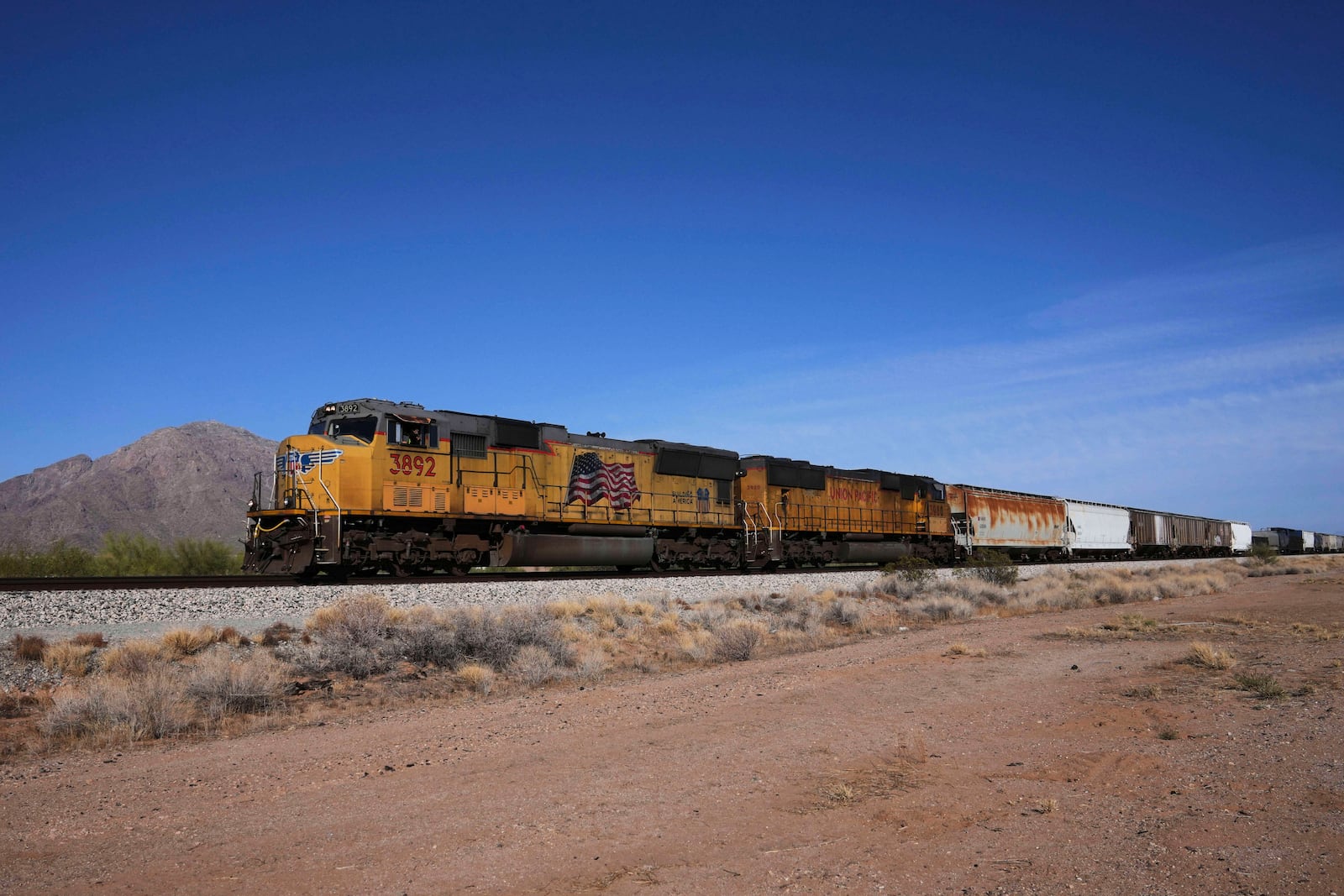FILE - A Union Pacific freight train travels along the tracks Thursday, April 17, 2025, in Eloy, Ariz. (AP Photo/Ross D. Franklin, File)