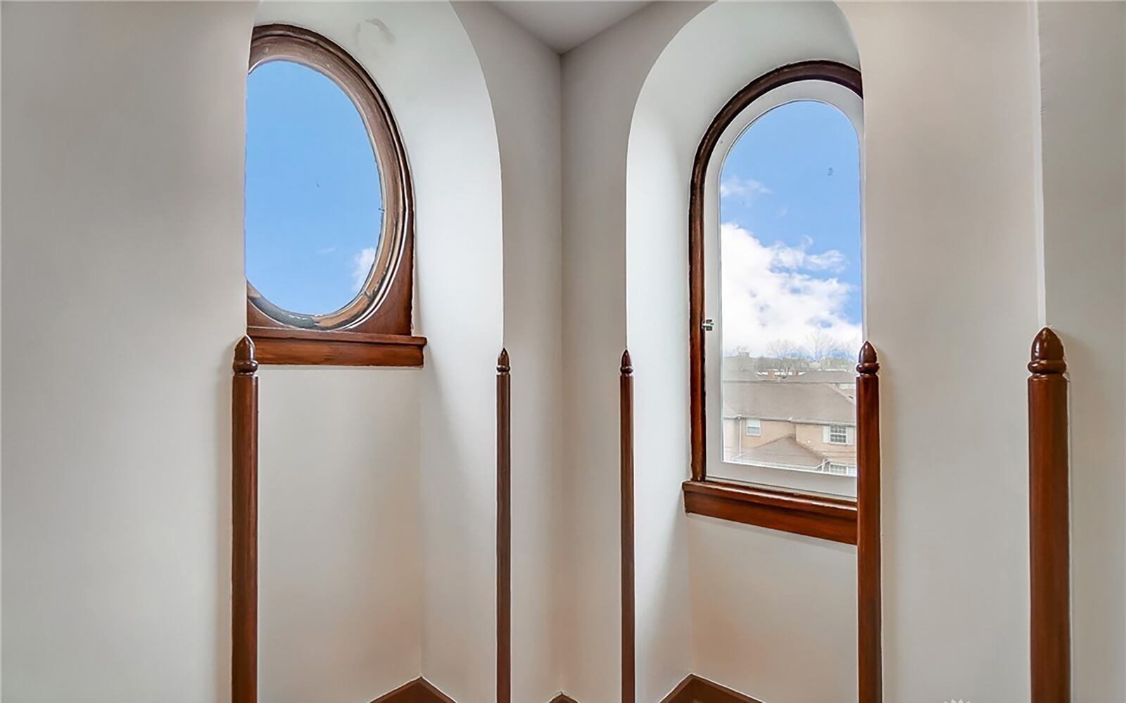 Unique architectural features original to the home still exist like these windows on the third level.
