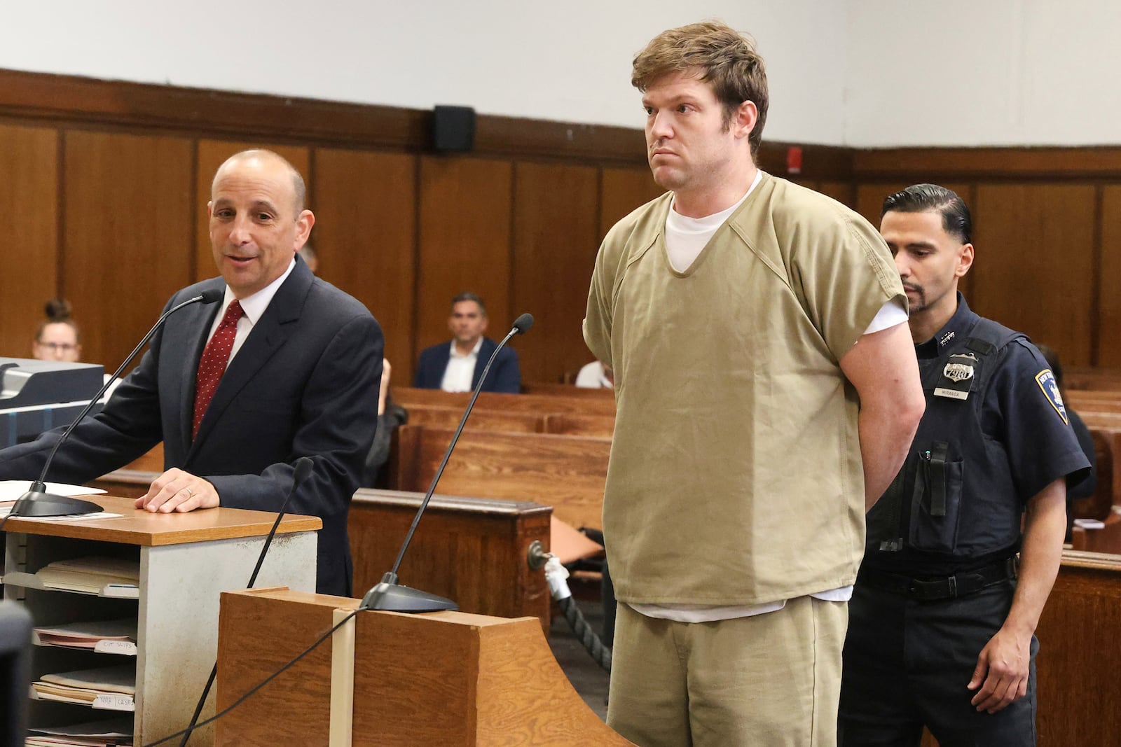 William Duplessie, charged with kidnapping and torture for trying to steal a man's Bitcoin password, appears with his defense attorney Sanford Talkin, left, in Manhattan Criminal court, Friday, May 30, 2025. (Jefferson Siegel/The New York Times via AP, Pool)