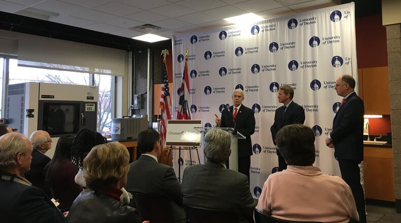 Lt. Governor Jon Husted and Ohio Department of Higher Education Chancellor Randy Gardner announce the new Choose Ohio First computer science scholarship program to a group of higher education leaders from across the state on Thursday, December 12. STAFF PHOTO / SARAH FRANKS