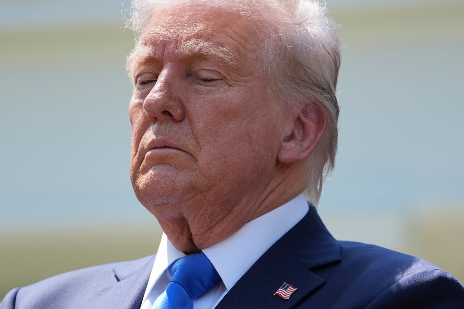 President Donald Trump listens during a National Day of Prayer event in the Rose Garden of the White House, Thursday, May 1, 2025, in Washington. (AP Photo/Evan Vucci)