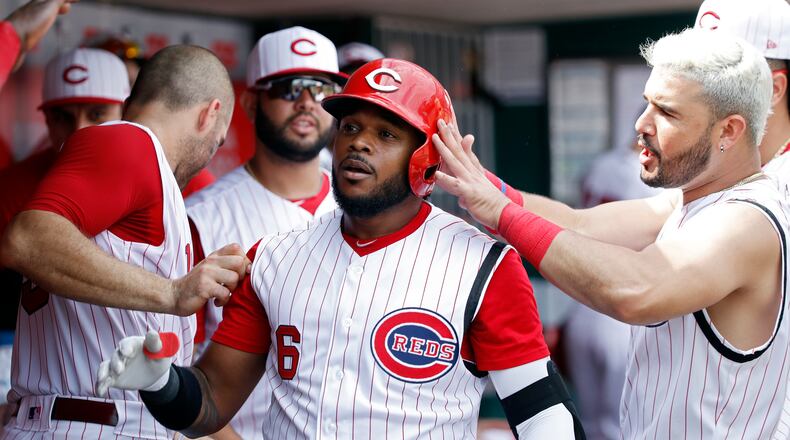CINCINNATI, OH - JULY 21: Phillip Ervin #6 of the Cincinnati Reds celebrates in the dugout after hitting a solo home run in the eighth inning against the St. Louis Cardinals at Great American Ball Park on July 21, 2019 in Cincinnati, Ohio. The Cardinals won 3-1. (Photo by Joe Robbins/Getty Images)