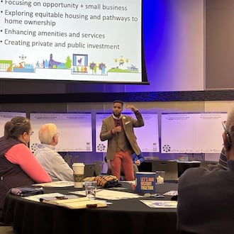 Karlos L. Marshall, co-founder and co-executive director of The Conscious Connect CDC, speaks at the Springfield 2051 Community Summit Tuesday, March 24, 2026 at the Hollenbeck-Bayley Creative Arts and Conference Center. JESSICA OROZCO/STAFF