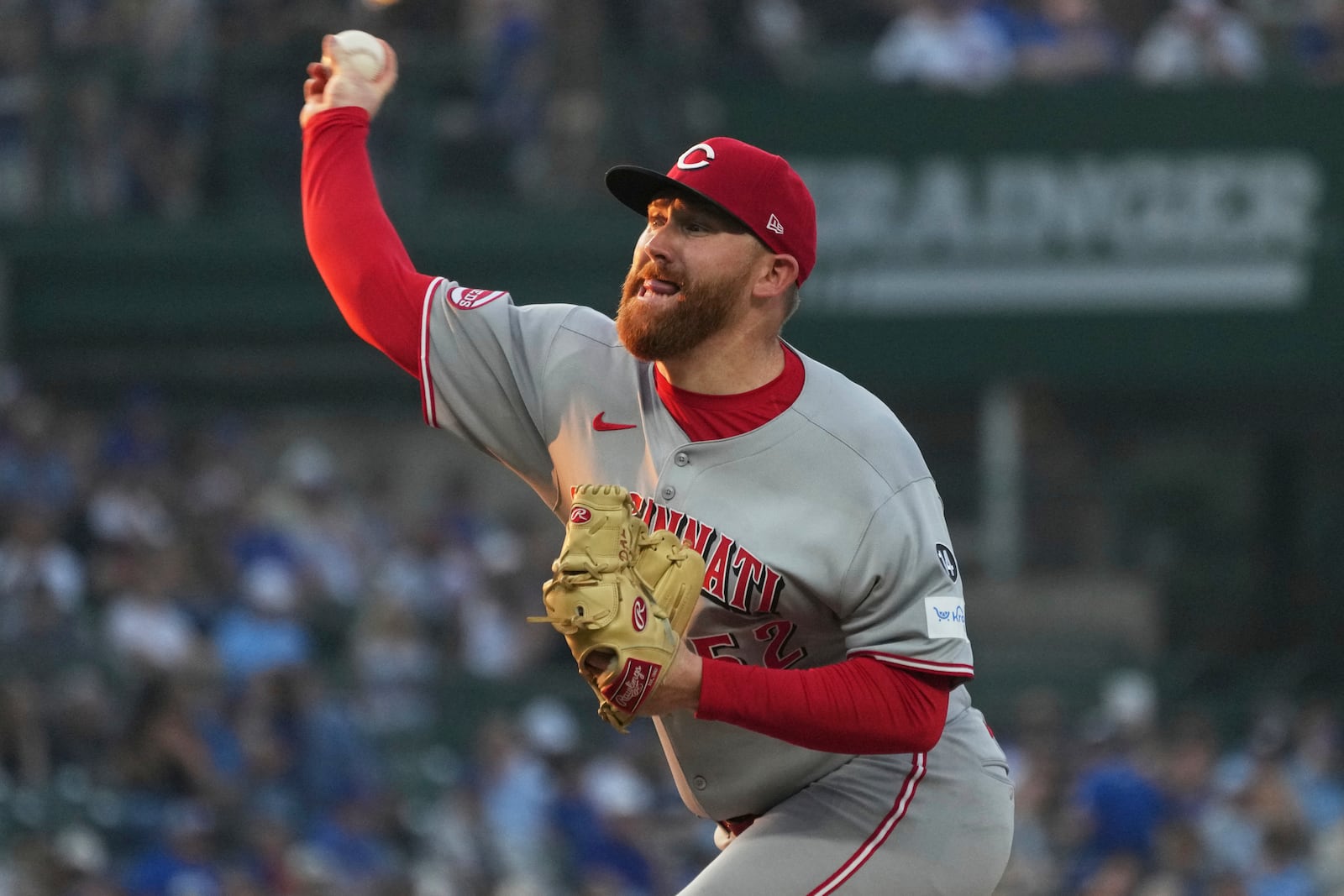 Cincinnati Reds starting pitcher Zack Littell throws against the Chicago Cubs during the first inning of a baseball game in Chicago, Tuesday, Aug. 5, 2025. (AP Photo/Nam Y. Huh)