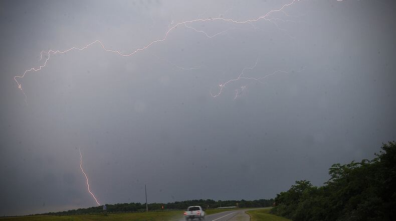 Storms move through the Miami Valley producing strong winds and lightning Friday, June 18, 2021. MARSHALL GORBY\STAFF