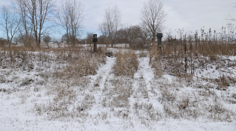 The former Roberts Landfill at 5001 N. Ludlow Road in Champaign County is marked by Private Property signs. BILL LACKEY/STAFF