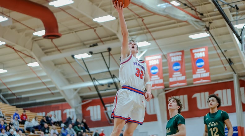 Northwestern High School junior Mason McDermott drives to the hoop during their game against Catholic Central on Monday, Dec. 29 at Wittenberg University's Pam Evans Smith Arena. MICHAEL COOPER / STAFF PHOTO