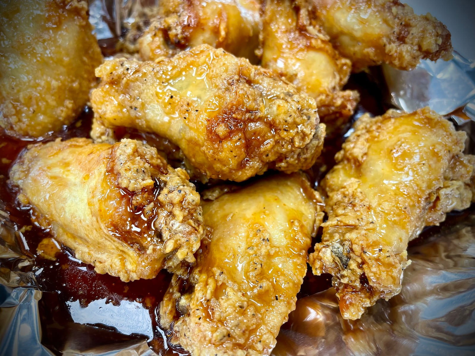 Sourmugs Wings & BBQ is one of six vendors inside The Social at Piqua Center. NATALIE JONES/STAFF