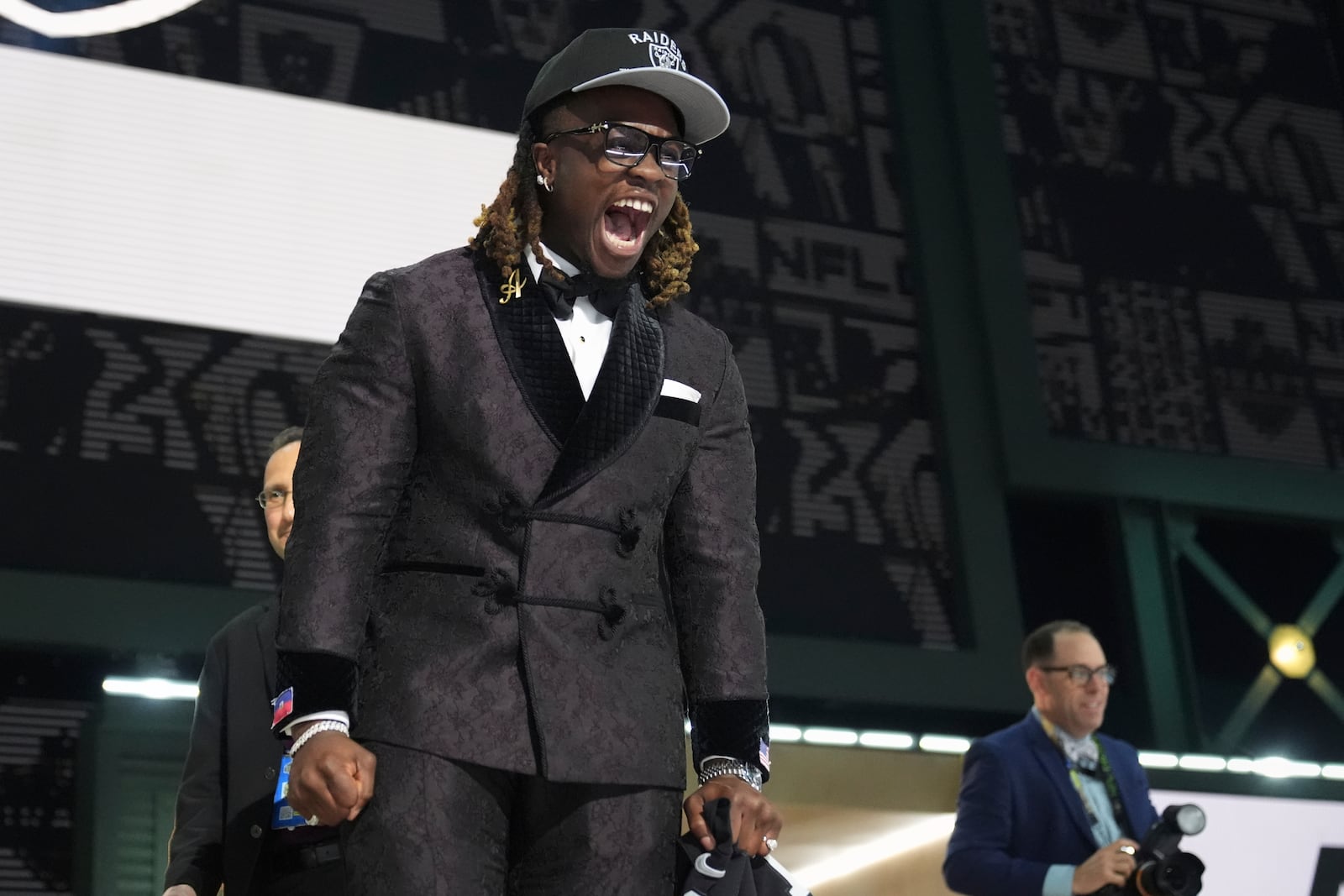 Boise State running back Ashton Jeanty celebrates after being chosen by the Las Vegas Raiders with the sixth overall pick during the first round of the NFL football draft, Thursday, April 24, 2025, in Green Bay, Wis. (AP Photo/Jeff Roberson)