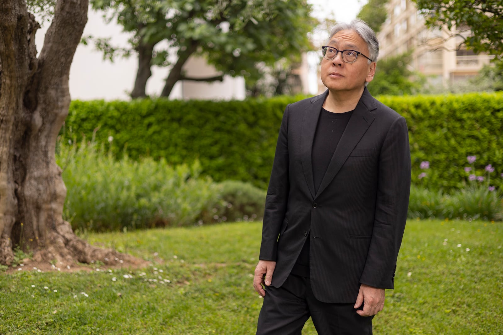 Author Kazuo Ishiguro poses for portrait photographs for the film 'A Pale View of Hills' at the 78th international film festival, Cannes, southern France, Friday, May 16, 2025. (Photo by Joel C Ryan/Invision/AP)