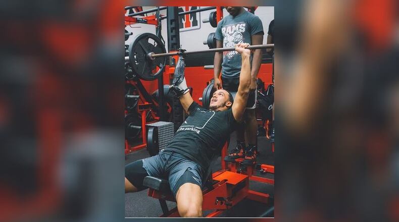 Issiah Evans lifting with his new Bionic "hero arm" for the first time. CONTRIBUTED