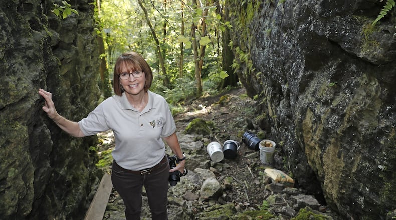 Carol Kennard, executive director of the Clark County Park District, at the entrance to the Mad River Gorge climbing area Friday. The Clark County Park District has recently purchased Mad River Gorge and pulled over 125,000 pounds of trash from the gorge, but they still have more to go. Leave No Trace Behind has chosen the gorge as one of 15 hot spots in the country to assist with this process. Bill Lackey/Staff