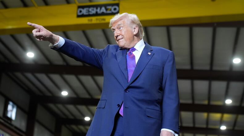 President Donald Trump arrives to speak at Coosa Steel Corporation in Rome, Ga., Thursday, Feb. 19, 2026. (AP Photo/Mark Schiefelbein)