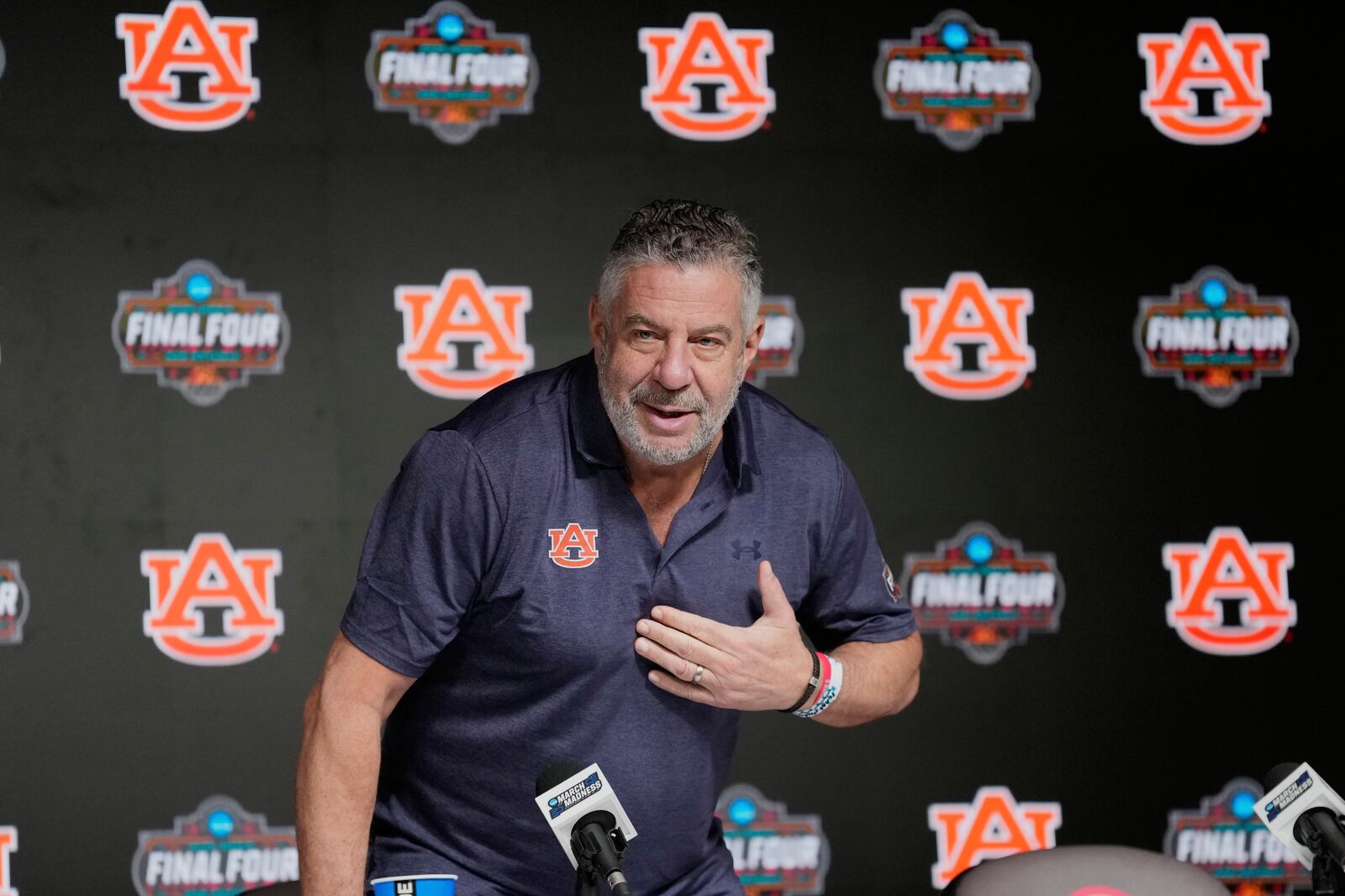 Auburn head coach Bruce Pearl sits down for a news conference during media day at the Final Four of the NCAA college basketball tournament, Thursday, April 3, 2025, in San Antonio. (AP Photo/Eric Gay)