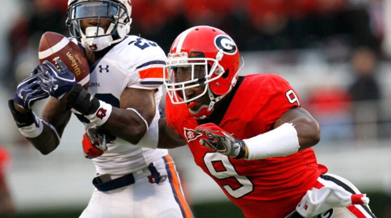 ATHENS, GA - NOVEMBER 12: Alec Ogletree #9 of the Georgia Bulldogs breaks a up a pass intended for Onterio McCalebb #23 of the Auburn Tigers at Sanford Stadium on November 12, 2011 in Athens, Georgia. (Photo by Kevin C. Cox/Getty Images)