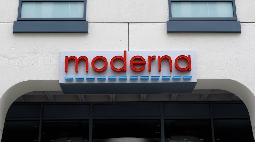 FILE - A sign marks an entrance to a Moderna building in Cambridge, Mass., May 18, 2020. (AP Photo/Bill Sikes, File)